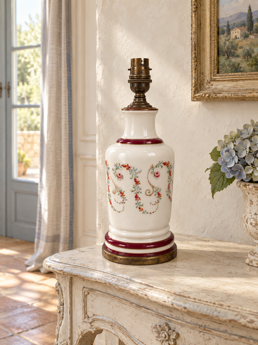 Floral garland vintage porcelain lamp in an interior; lampshade not included