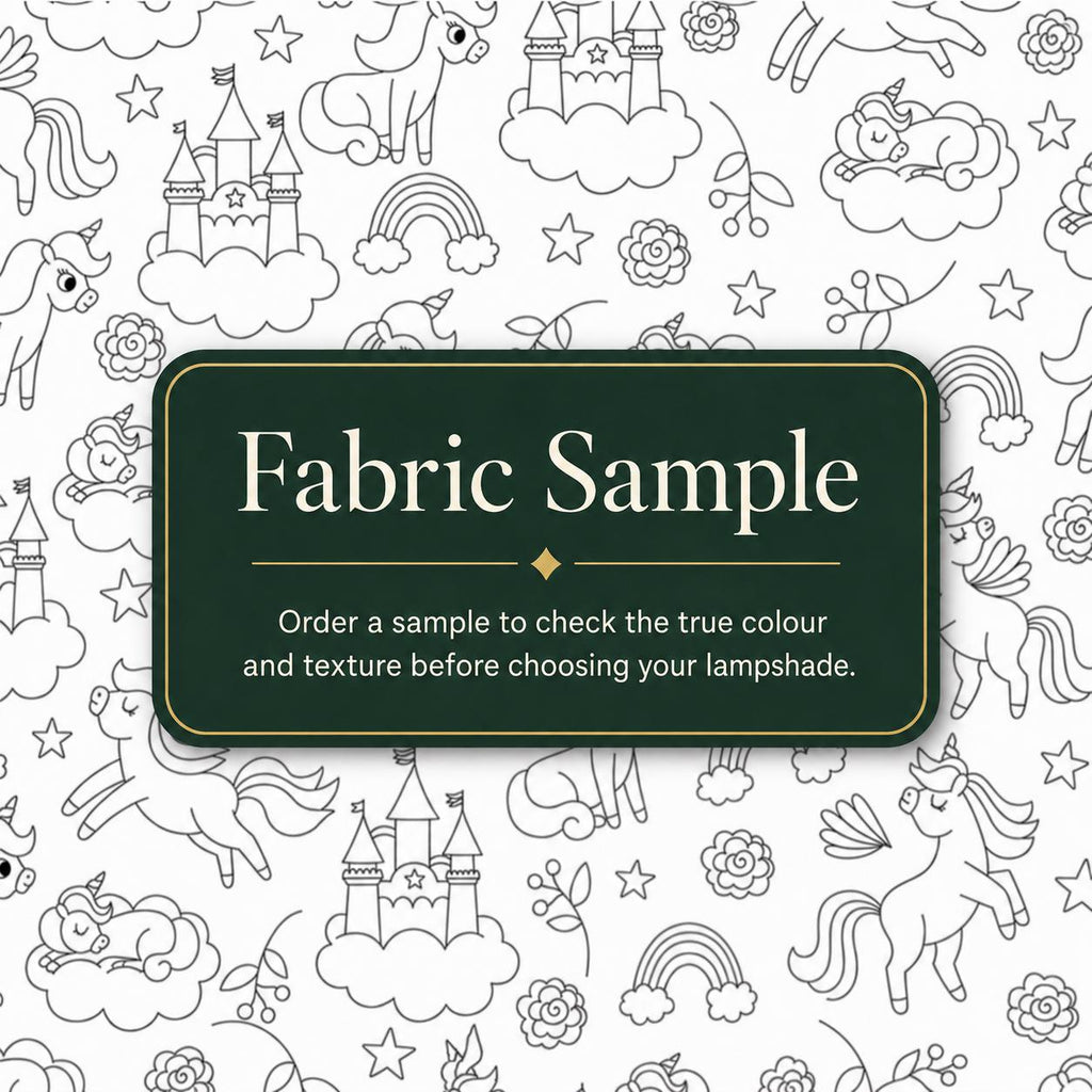 Black-and-white colour-in fabric sample with castles and playful motifs for the Kids DIY Lampshade Kit