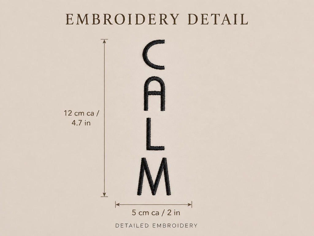 Additional product view of brick red COZY CALM GLOW embroidered lumbar cushions