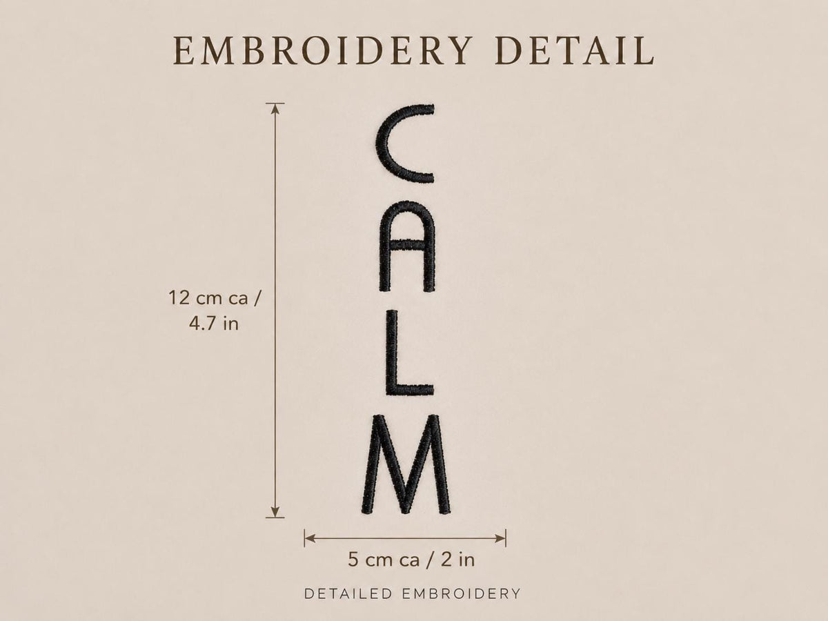 Additional product view of brick red COZY CALM GLOW embroidered lumbar cushions