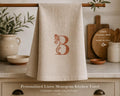 Personalised Italian linen kitchen towel with embroidered botanical monogram