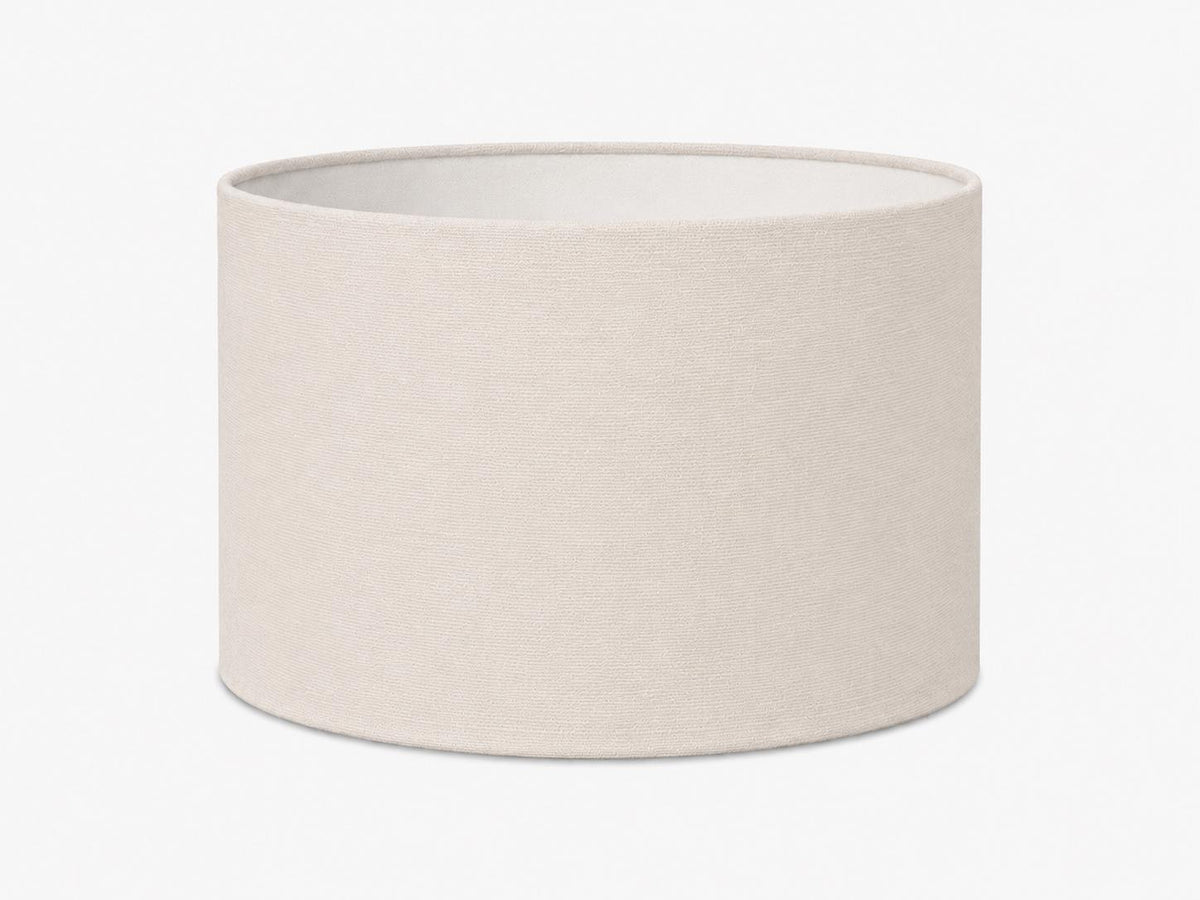 Handmade plain colour lampshade with white interior and fabric-covered edges