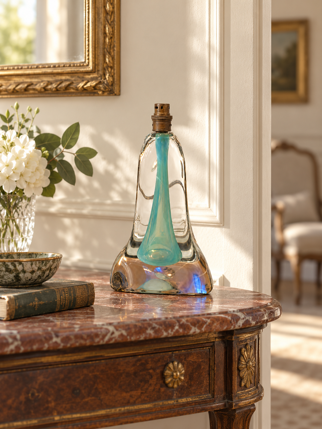 Vintage clear and aqua glass table lamp shown in an interior without lampshade