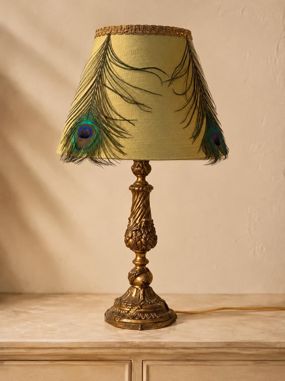 Green silk conical lampshade with genuine peacock feathers and bronze trim, front view