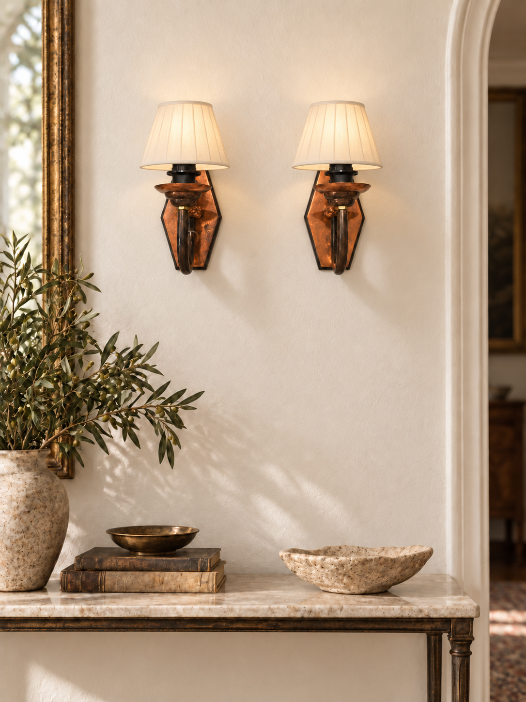 Pair of vintage copper wall sconces styled with plain cream fan shades, shades not included