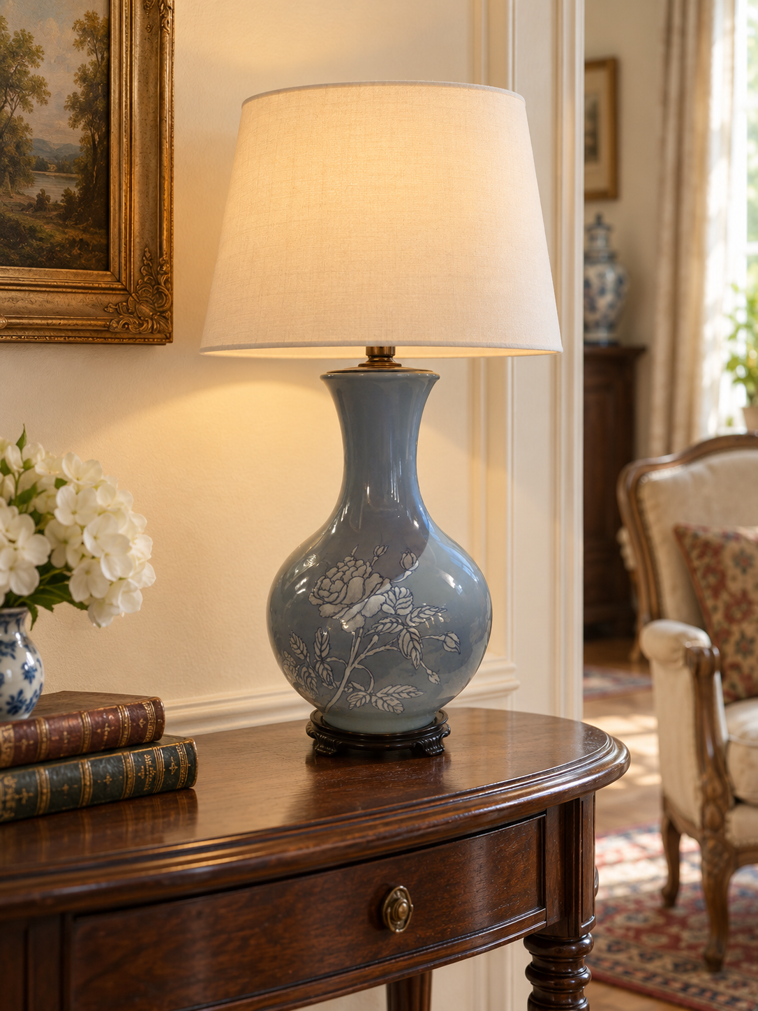 Vintage light blue ceramic table lamp styled with a plain ivory shade, shade not included