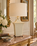 Vintage tole peinte table lamp styled with an ivory cylindrical shade, shade not included